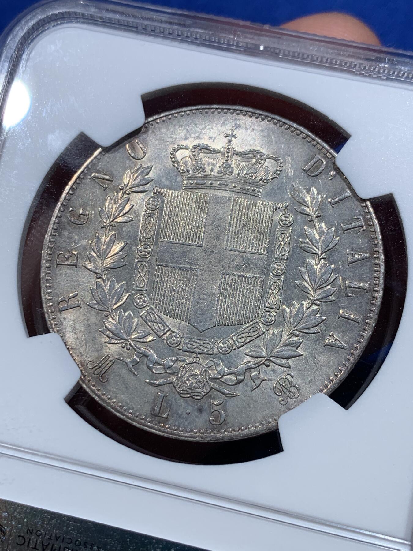 《竞宝斋》第415场 周日，周一，2场连拍 （全场包邮） NGC MS63 意大利1875M埃曼努尔二世流通5里拉大银币，淡金彩，米兰厂出品。意系流通主币大银，高分难遇，更高分仅有4枚。同年一枚64+稀奇5201元不含佣金成交。