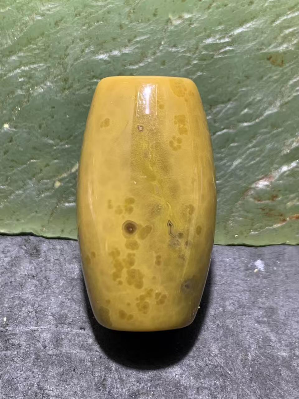 精美罕见黄冻料战国红玛瑙桶珠一个，