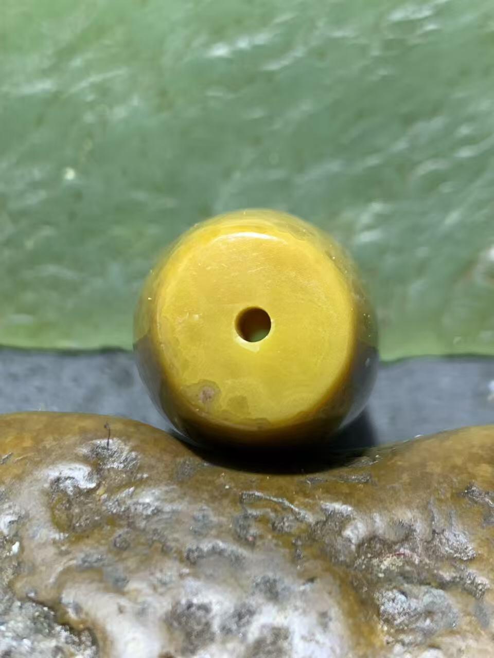 精美罕见黄冻料战国红玛瑙桶珠一个，