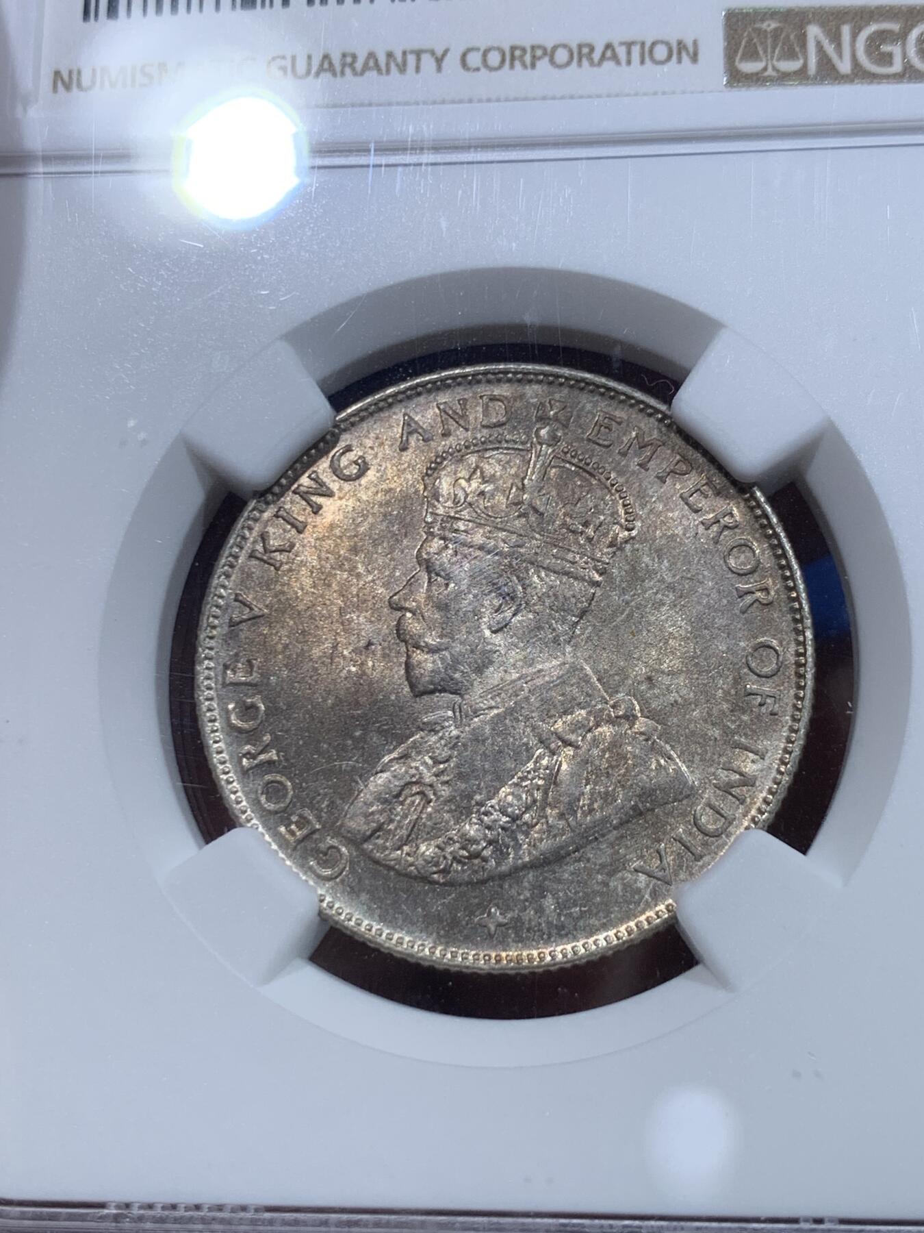 《竞宝斋》第415场 周日，周一，2场连拍 （全场包邮） NGC MS63 英属海峡殖民地1921年乔五50分半圆银币，金彩包浆，车轮光。半圆仍具潜力