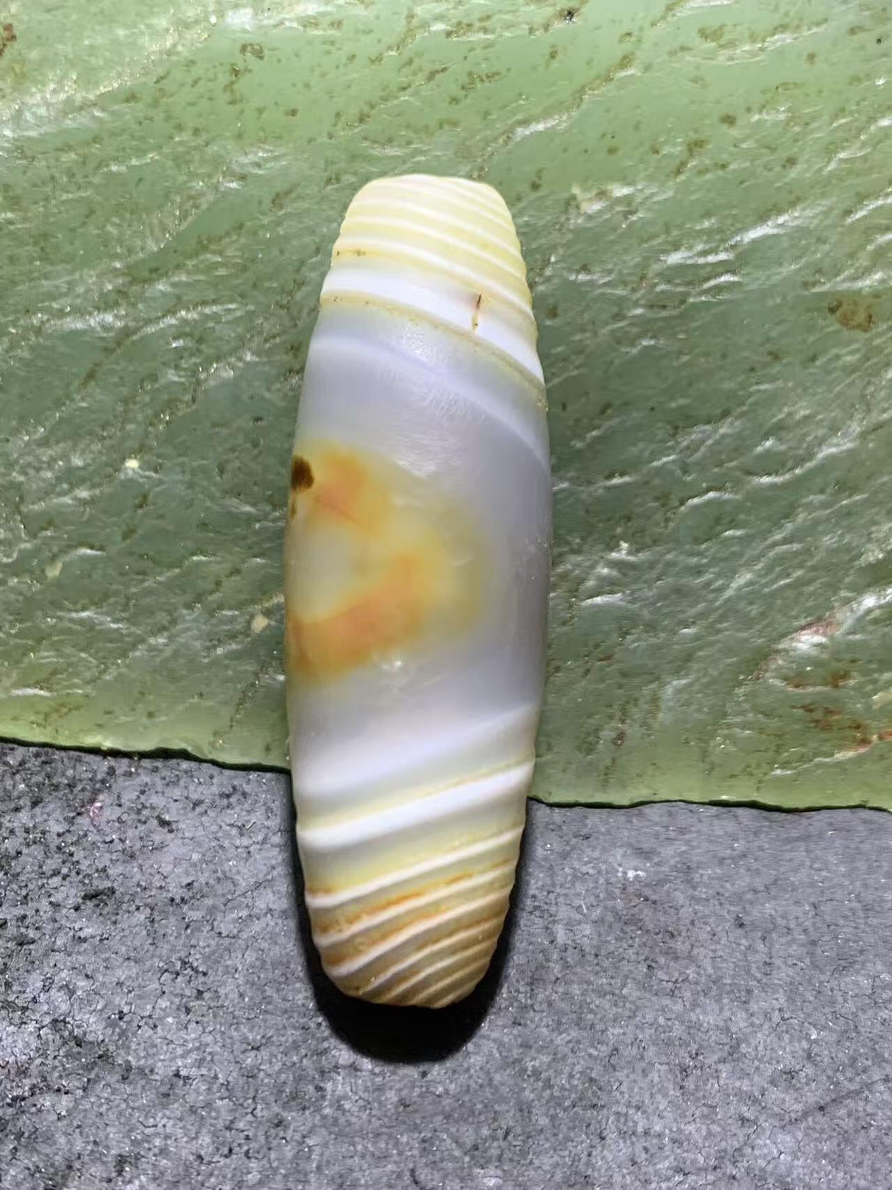 精美冰透千层风化纹缠丝玛瑙桶珠一颗