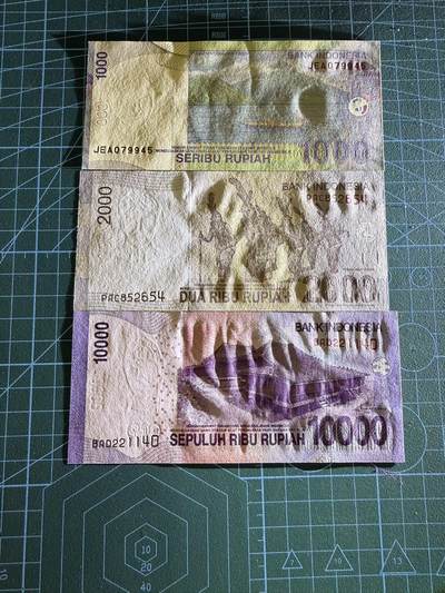 【炜奕收藏】，第四十三期 印尼1000-10000卢比3张，UNC品相