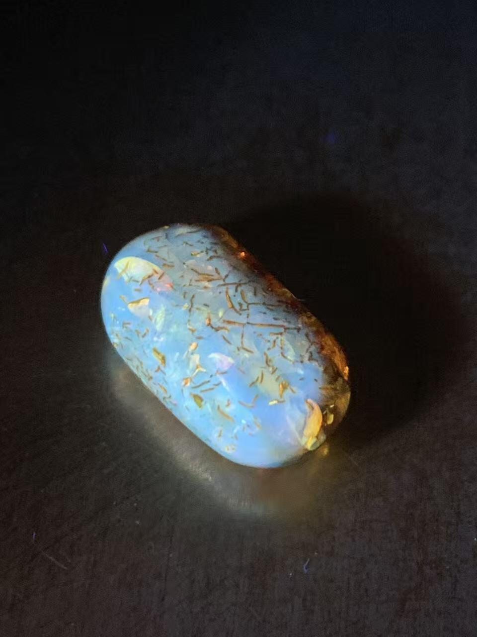 乌克兰花珀随形桶珠一个