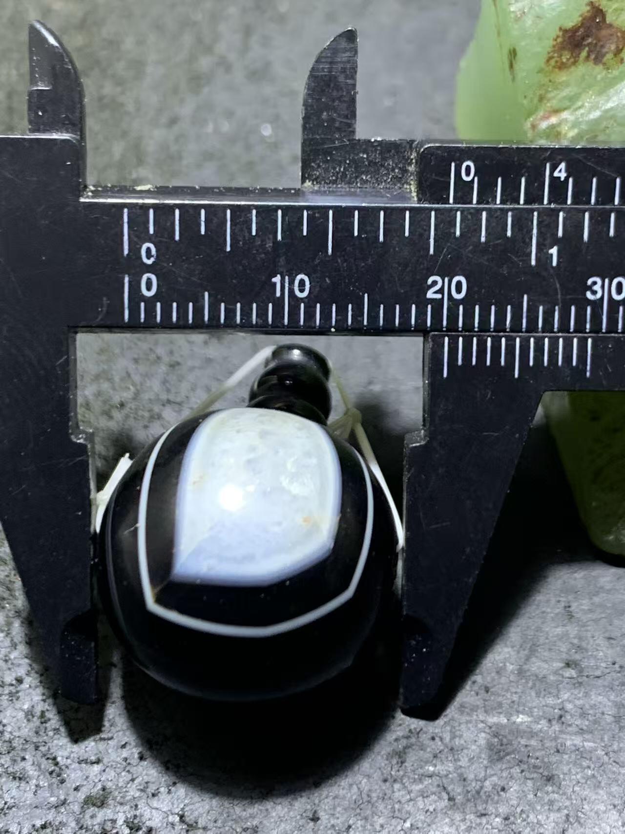 天眼纹药师玛瑙通货佛头三通一套，