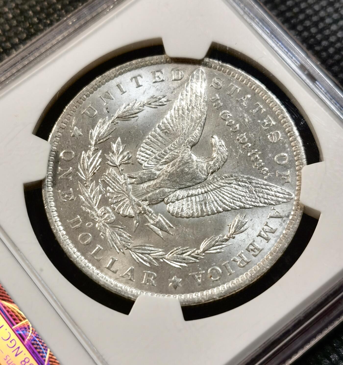 甄臻铺-世界币章拍卖（第32期），送拍享返佣金等优惠多多 NGC-MS63 1883年O版摩根，不多见的年份，美国标签，品相不输64