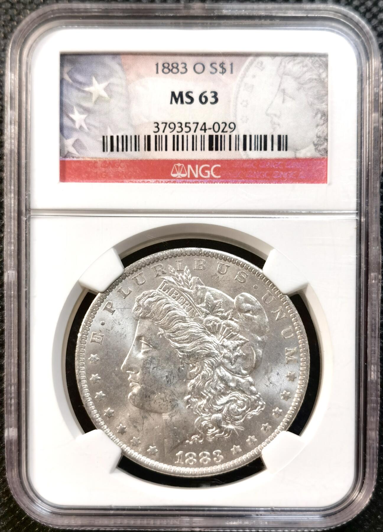 甄臻铺-世界币章拍卖（第32期），送拍享返佣金等优惠多多 NGC-MS63 1883年O版摩根，不多见的年份，美国标签，品相不输64
