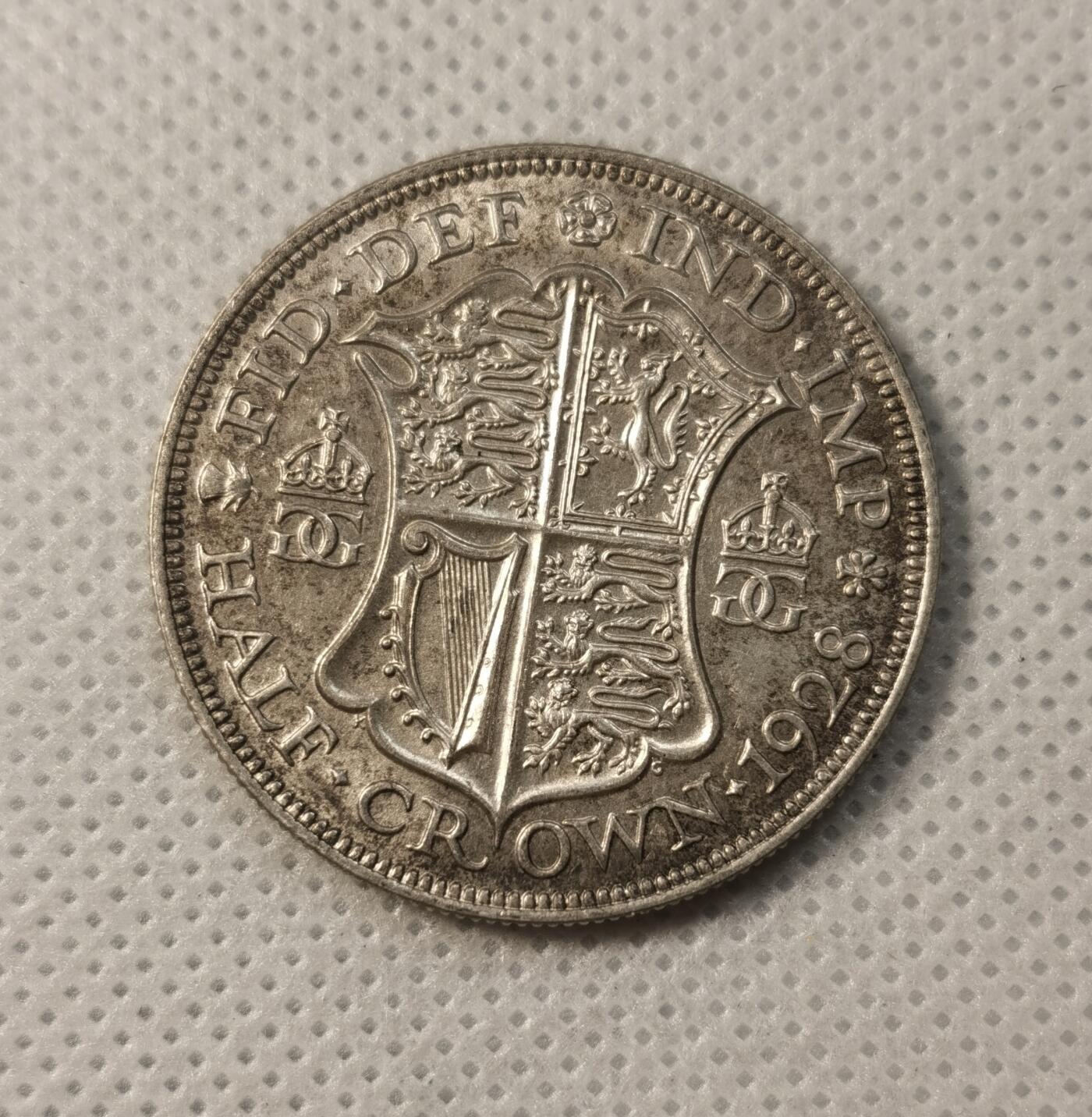甄臻铺-世界币章拍卖（第32期），送拍享返佣金等优惠多多 英国 1928年 乔治五世 半克朗银币 味道彩币 MS品相