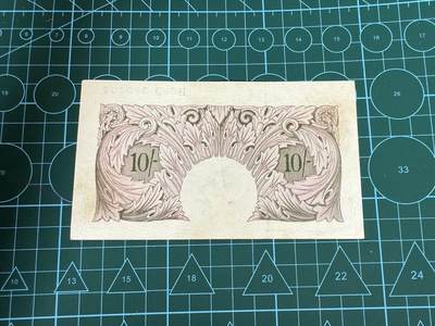 【炜奕收藏】，第四十三期 英国A序列战时紫色10先令，EF品相，少见品种