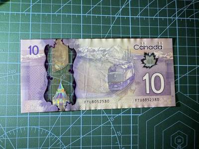 【炜奕收藏】，第四十三期 加拿大10元，AU品相，号码无47