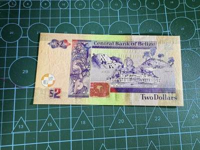 【炜奕收藏】，第四十三期 2017年伯利兹2元，UNC品相，号码无47