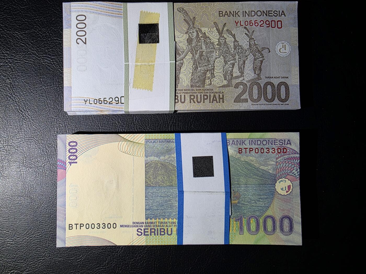 叁拾收藏第31期 印度尼西亚上一版本1000/2000卢比共两刀百连（含豹子号）   UNC