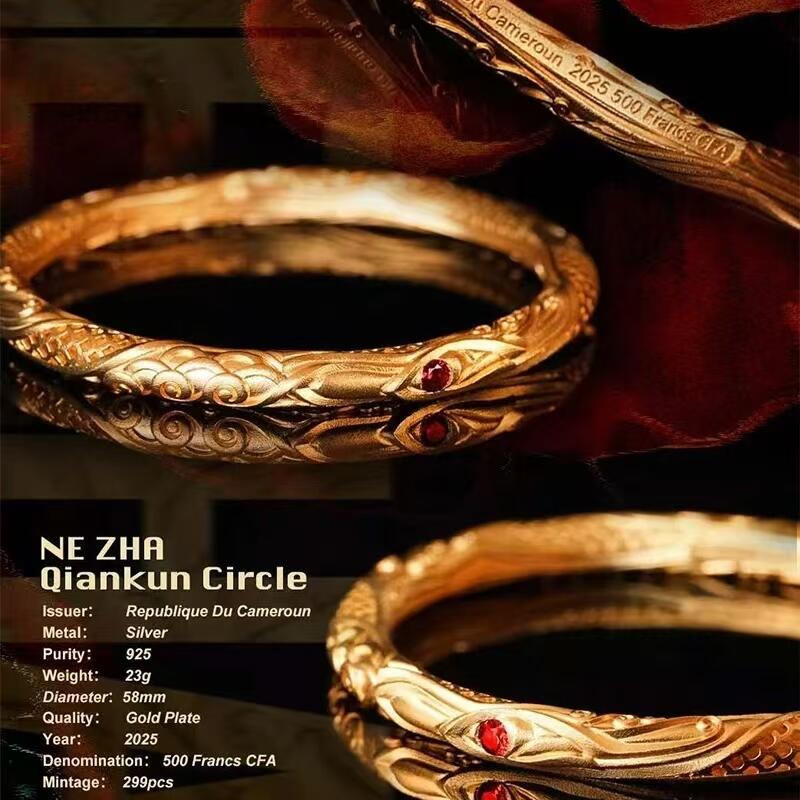 【德藏】世界币章拍卖第145期 - "秋色宜人"专场拍卖（拍品征集中~欢迎藏友联系） 2025年 喀麦隆哪吒乾坤圈镀金镶嵌环形纪念银币 原盒 带证书 直径约：58mm；重约：23g