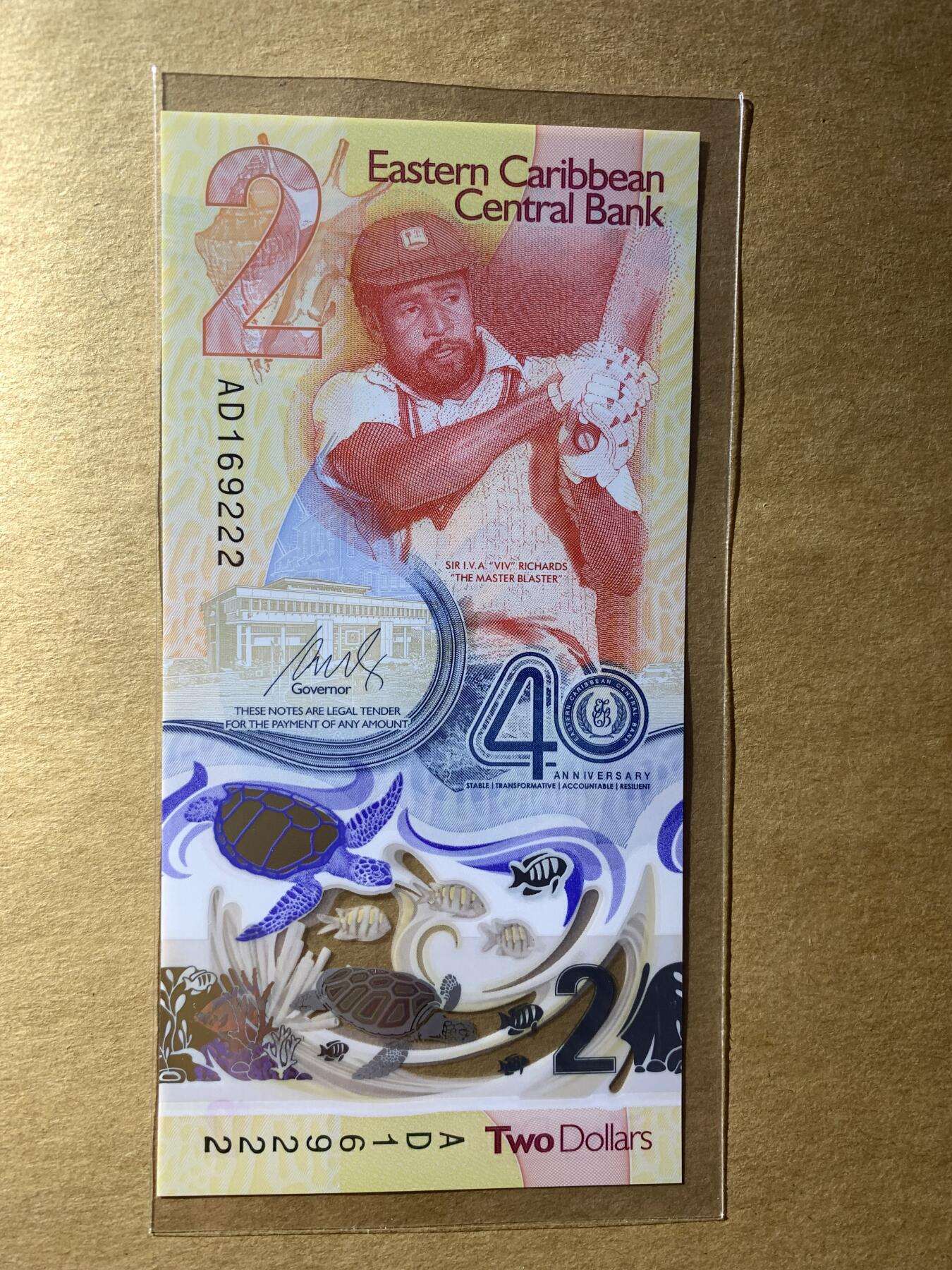 【礼羽收藏】🌏世界钱币拍卖第112期 【AD169222】全新UNC 2024年东加勒比2元纪念钞 无3457尾222 朦胧豹子号