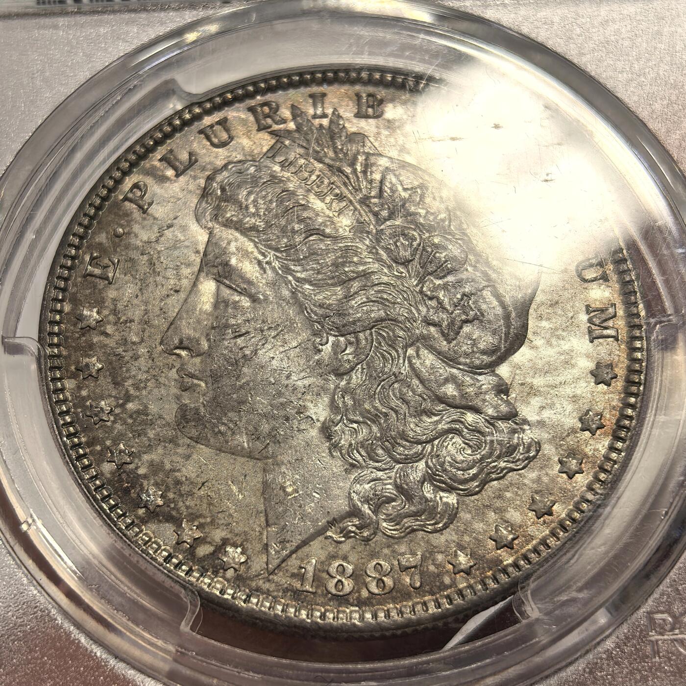 博洋堂世界钱币拍卖第137期（全场包邮） PCGS MS64 美国1887摩根，五彩包浆味道好。