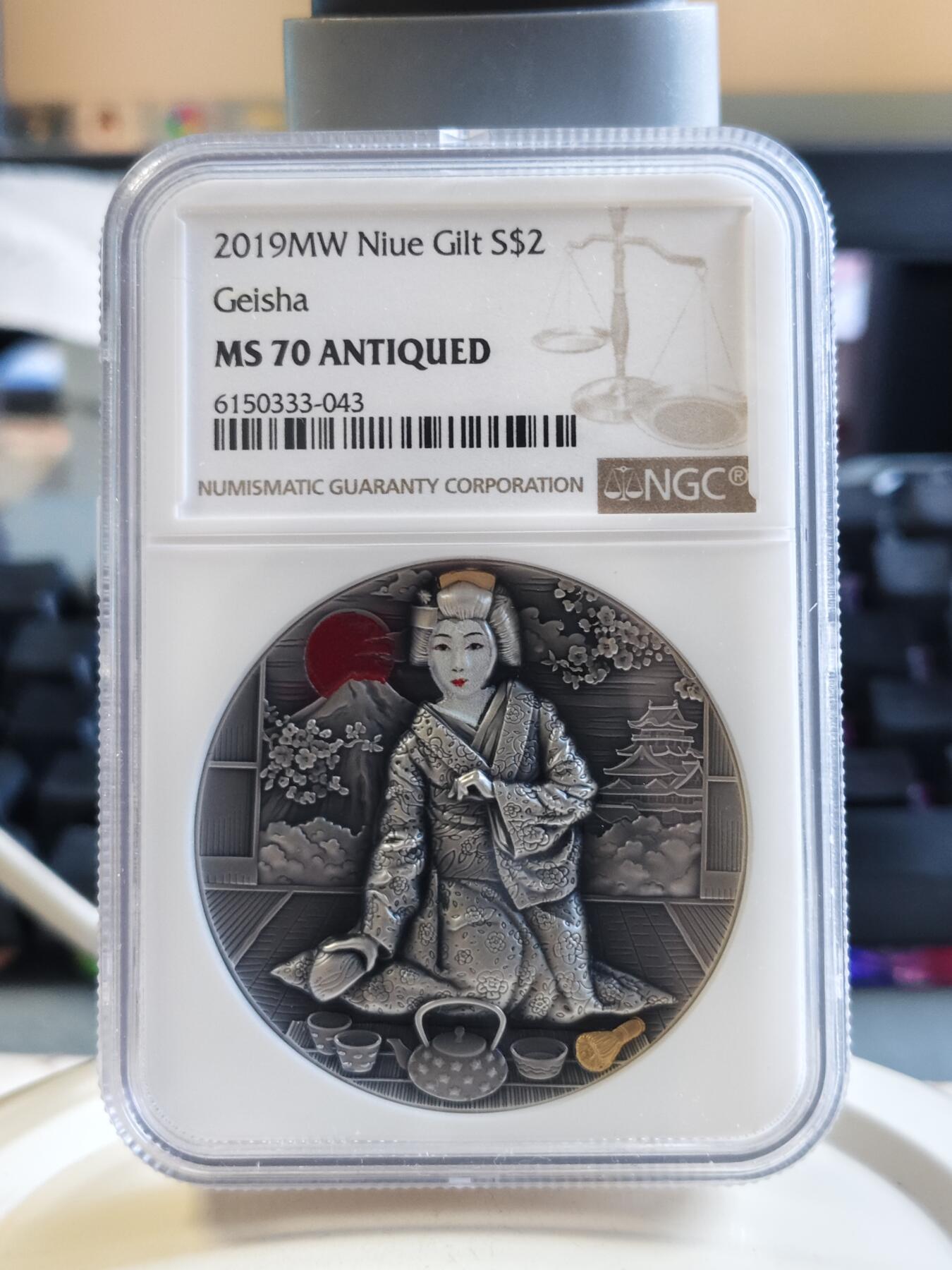 第173期拍卖【长期征集拍品】 纽埃2019年日本文化系列(1)-艺伎茶艺 2盎司超高浮雕仿古镀金彩色银币NGC-MS70盒证全. 999银，发行500枚