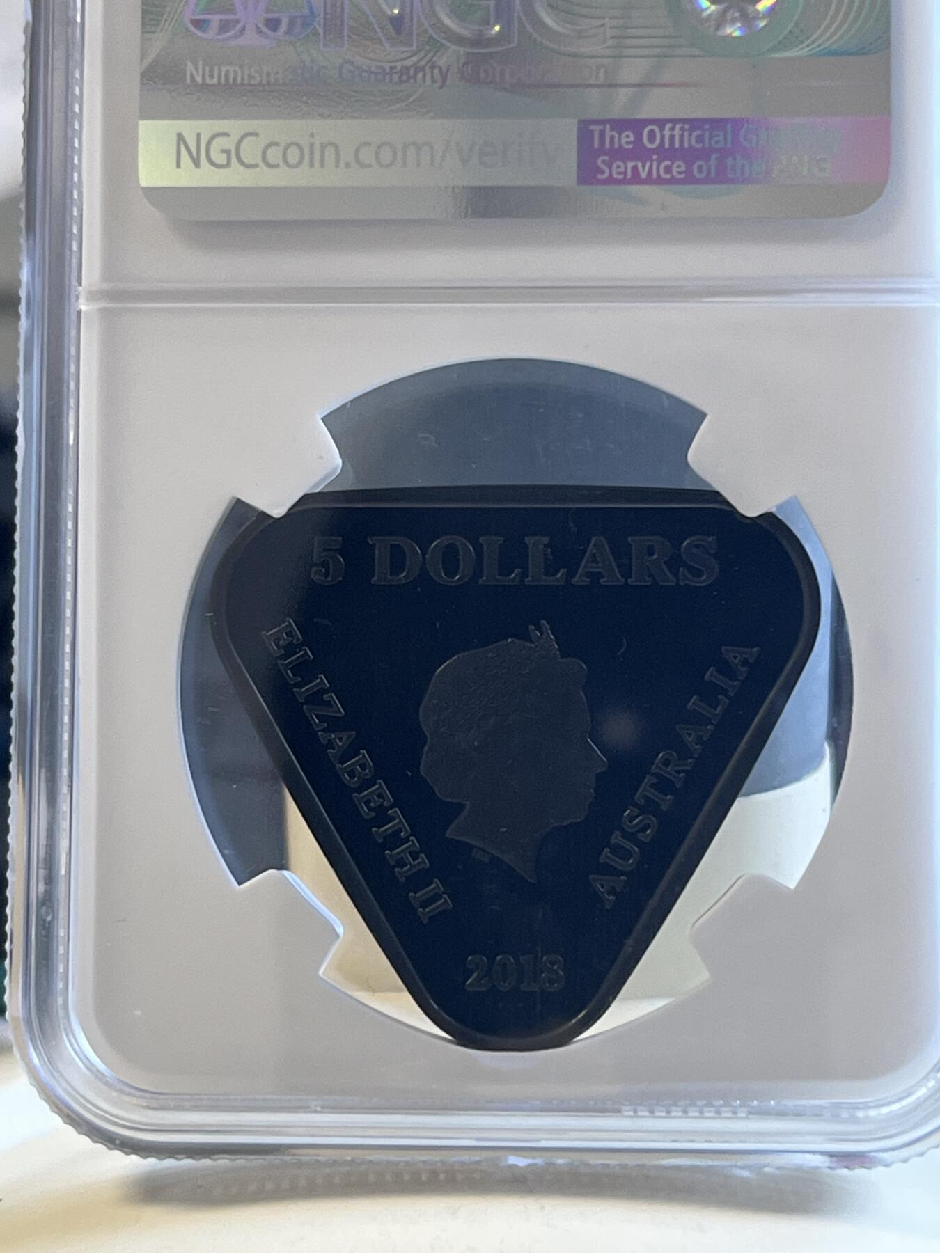第173期拍卖【长期征集拍品】 澳大利亚2018年AC/DC45周年三角形纪念银币NGC-PF70首原盒证书，999银，22.23克，发行10000枚