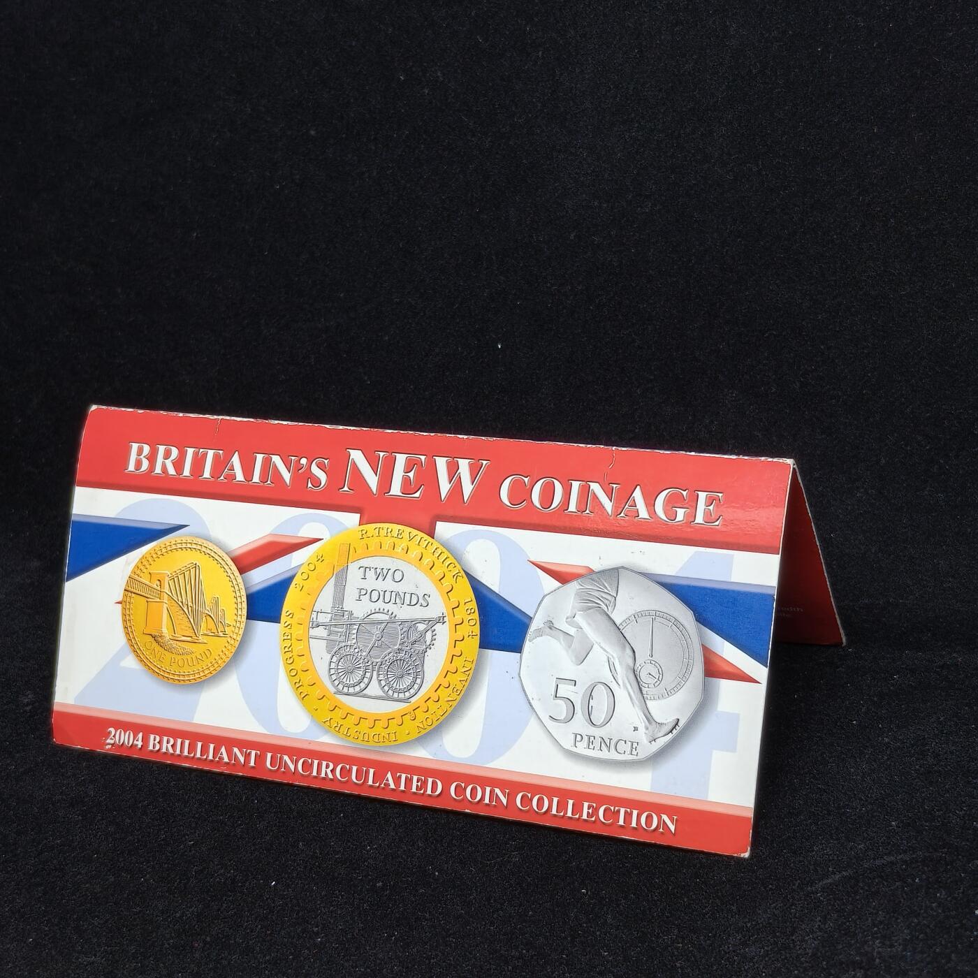 【铜匠收藏】★第125加场★精品币章场，200包邮，不满200.支付运费5元。《接受代拍 代送NGC评级》 英国2004年纪念币卡册，2磅蒸汽机车，1磅桥，50便士