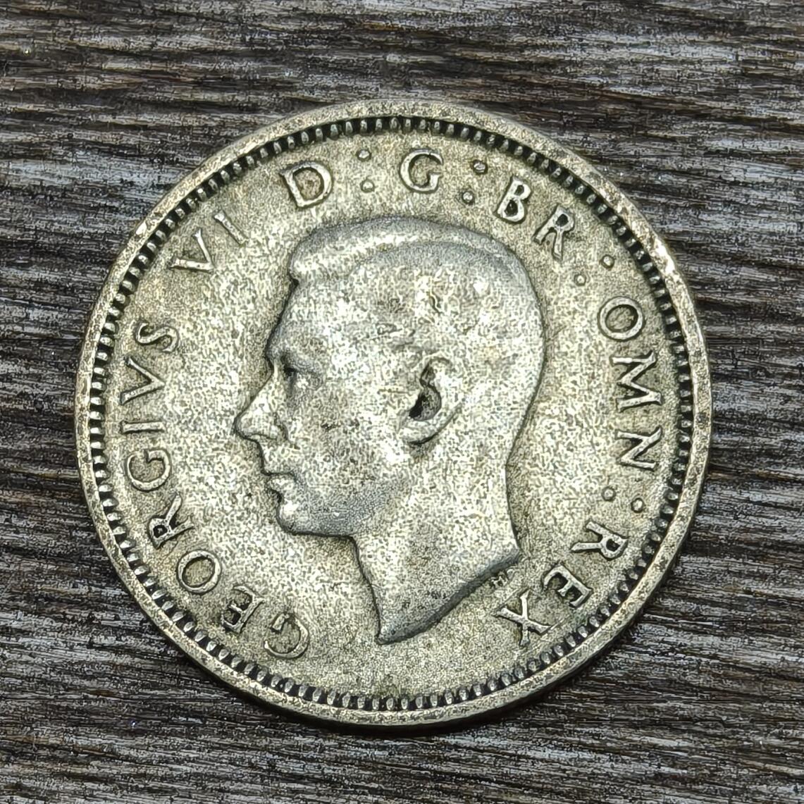 【铜匠收藏】★第130加场★精品币章场，200包邮，不满200.支付运费5元。《接受代拍 代送NGC评级》 英国 1942年 乔治6世头像 6便士 银币