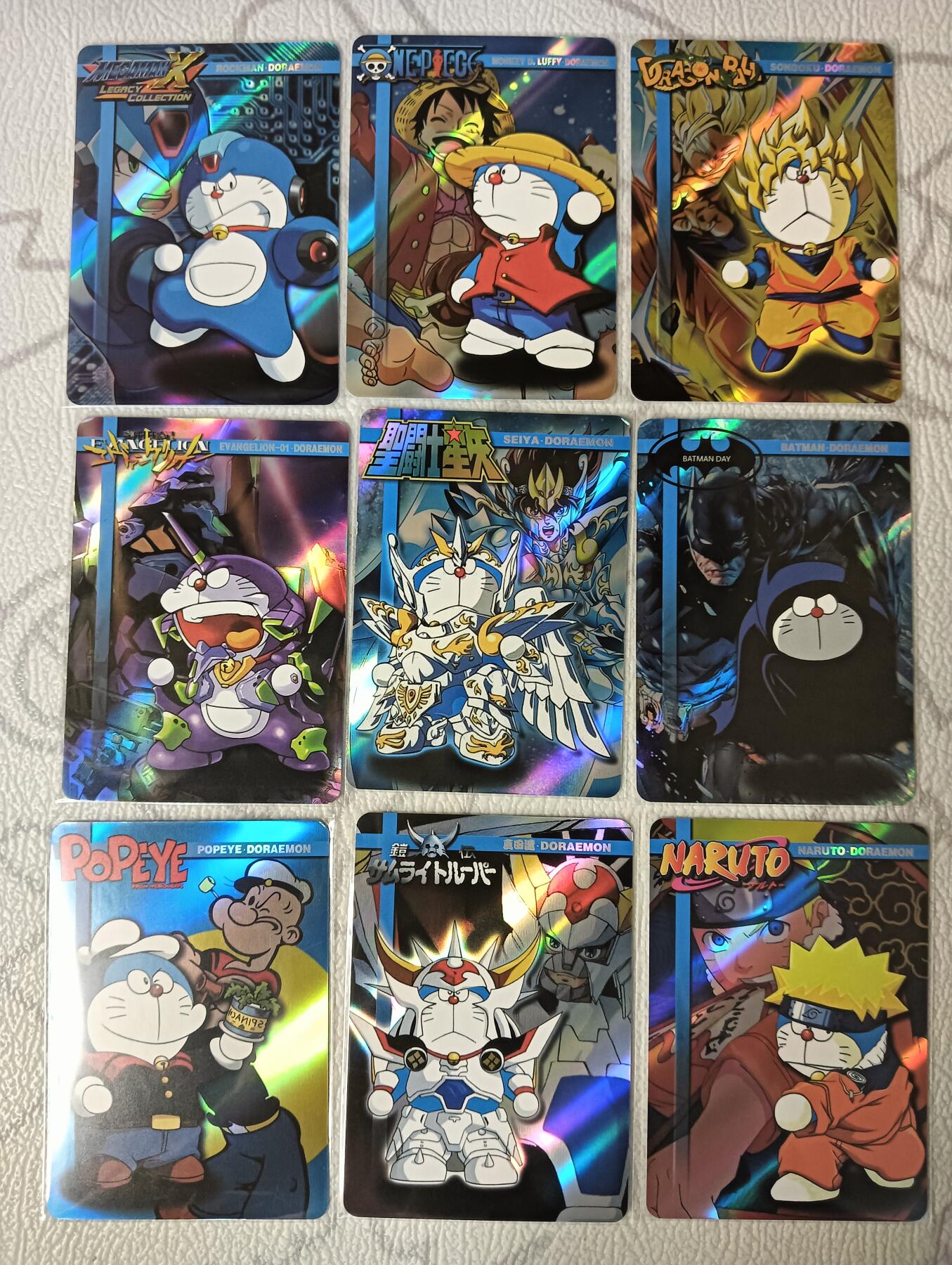 花开卡拍第37期（9月7号周日截拍，品控勿拍!!!拍品不寄存，运费5元，自制卡难免瑕疵，可能存在轻微撞角爆边等出厂瑕疵，品控介意勿拍！） 哆啦A梦卡牌 COS其他动漫角色系列 一套9张 斜纹彩闪，有一张边上有压痕