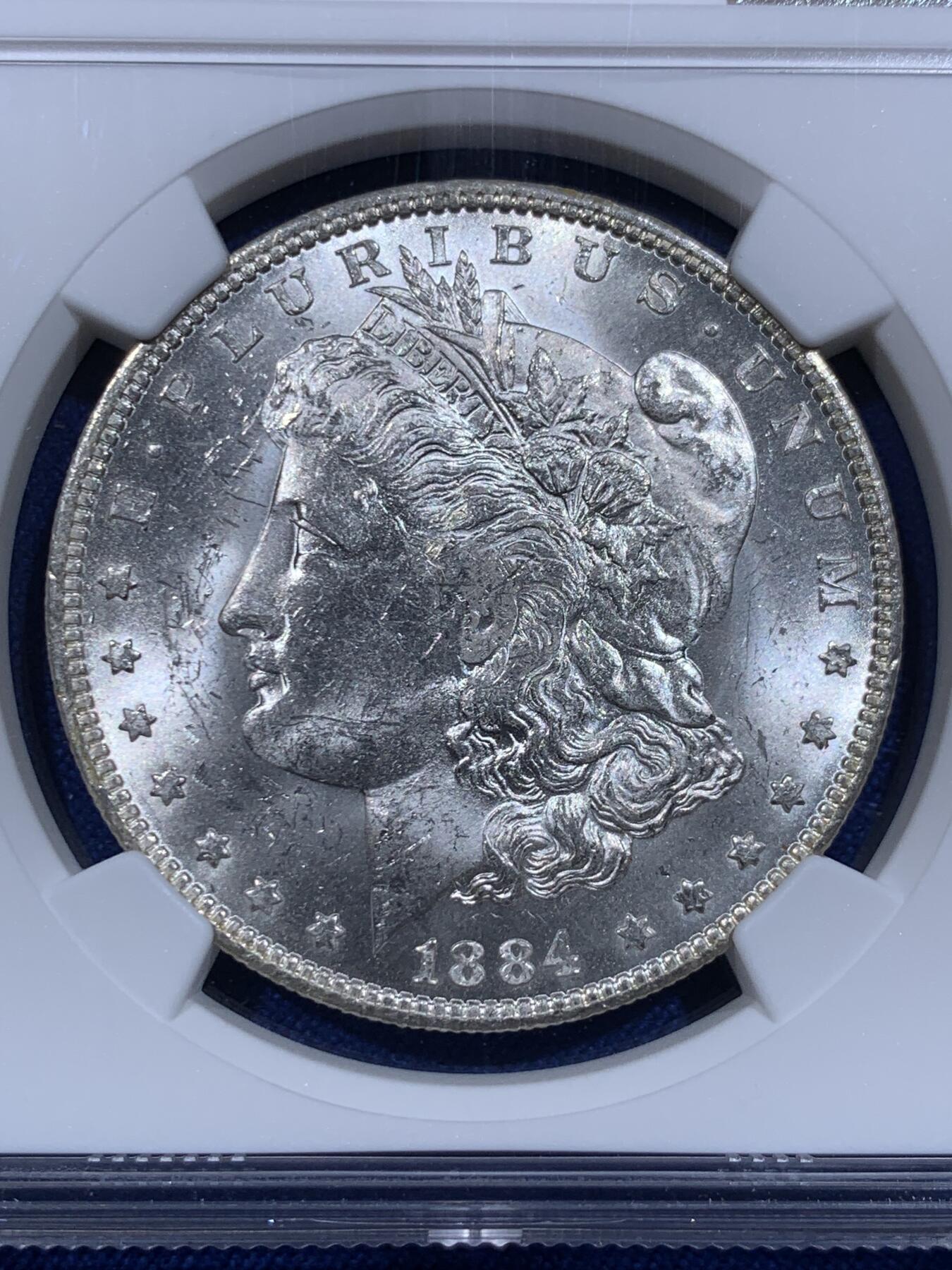 《竞宝斋》第416场 周日，周一，2场连拍 （全场包邮） NGC MS62 美国1884年O版摩根银币，好品好光