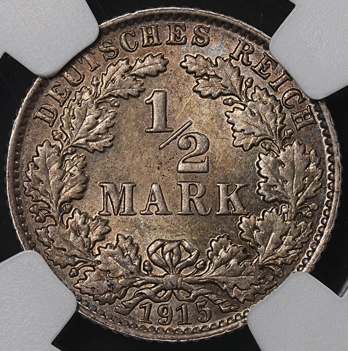 修遠堂世界钱币第八十三期 NGC评级 1915年德国1/2马克银币两枚 E厂铭，G厂铭 五彩包浆