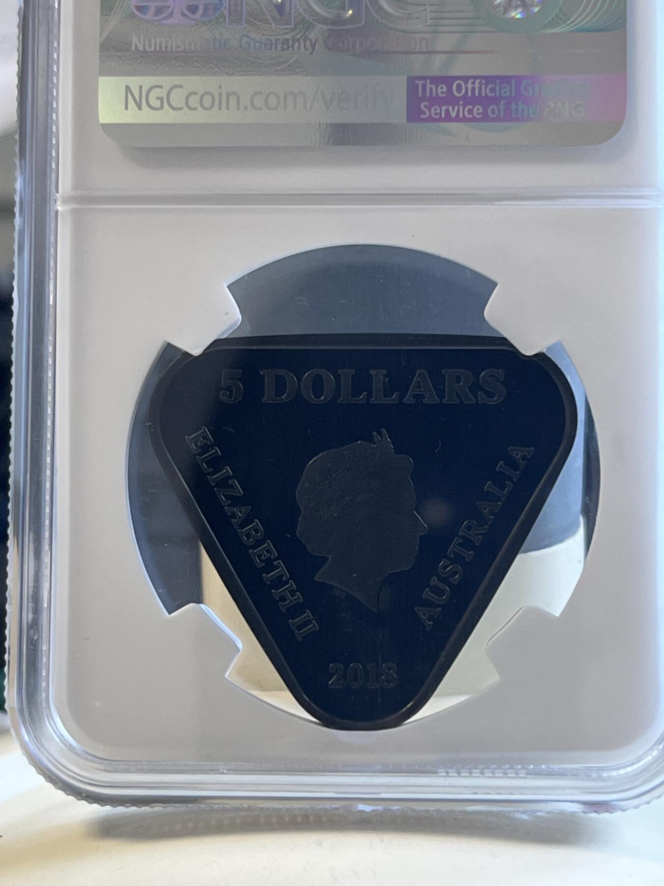 第173期拍卖【长期征集拍品】 澳大利亚2018年AC/DC45周年三角形纪念银币NGC-PF70首原盒证书，999银，22.23克，发行10000枚