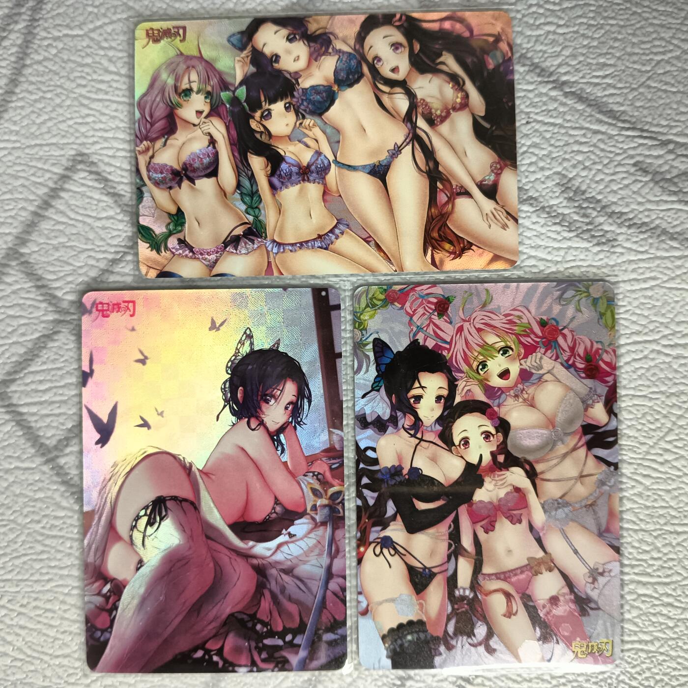 花开卡拍第37期（9月7号周日截拍，品控勿拍!!!拍品不寄存，运费5元，自制卡难免瑕疵，可能存在轻微撞角爆边等出厂瑕疵，品控介意勿拍！） 鬼灭之刃3张 彩闪