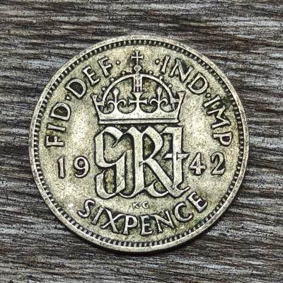 【铜匠收藏】★第130加场★精品币章场，200包邮，不满200.支付运费5元。《接受代拍 代送NGC评级》 - 英国 1942年 乔治6世头像 6便士 银币