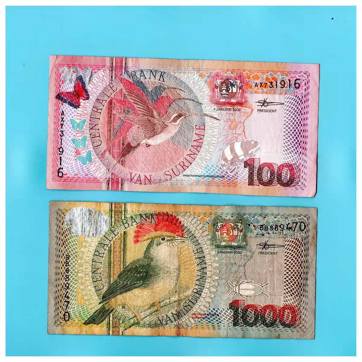 苏里南2000年100+1000元2枚品相如图  特价