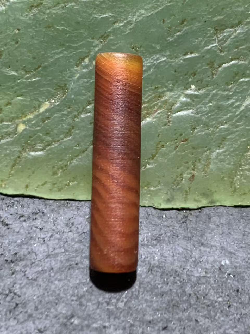 亚光风化纹高玉化酒红色千层纹缠丝玛瑙管珠一颗