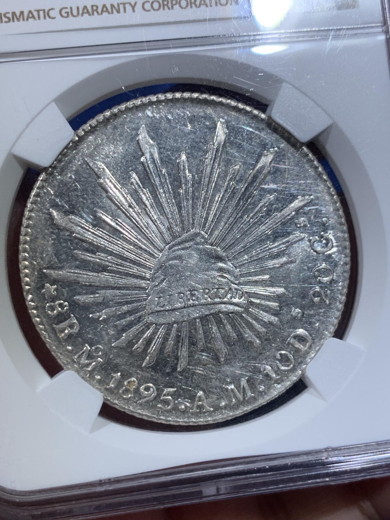 《竞宝斋》第417场 周日，周一，2场连拍 （全场包邮） NGC MS61 墨西哥 1895年 花边鹰洋 MO AM 8瑞尔 银币 这枚底板干净光度十足 适合喜欢银光的朋友收藏 低评