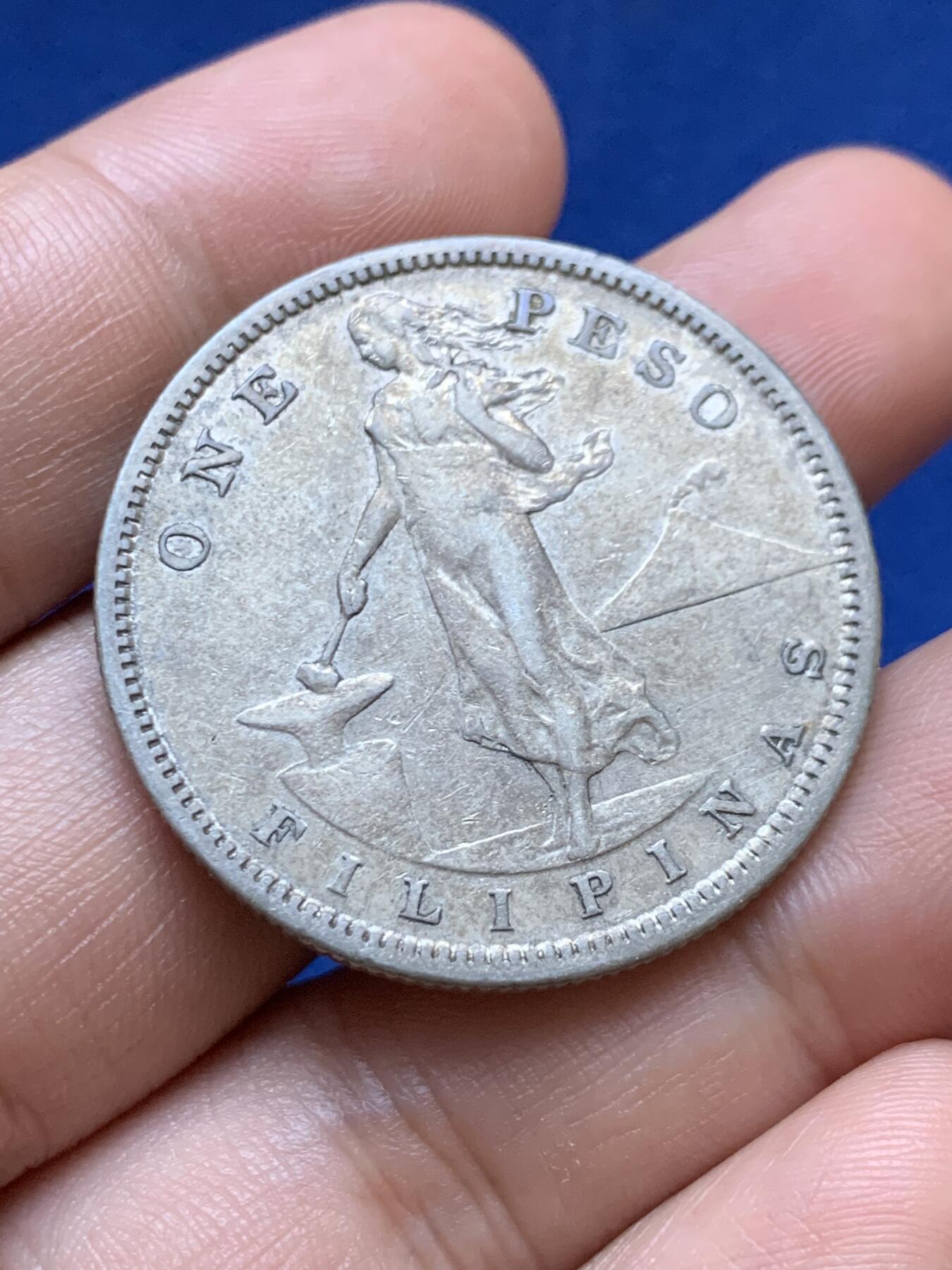 《竞宝斋》第417场 周日，周一，2场连拍 （全场包邮） 美属菲律宾1907年打铁1比索银币，带点包浆。