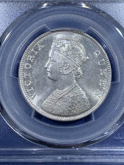 《竞宝斋》第417场 周日，周一，2场连拍 （全场包邮） PCGS MS62 英属印度1862年维多利亚1卢比银币，币面清爽干净，转光强烈细节优秀。