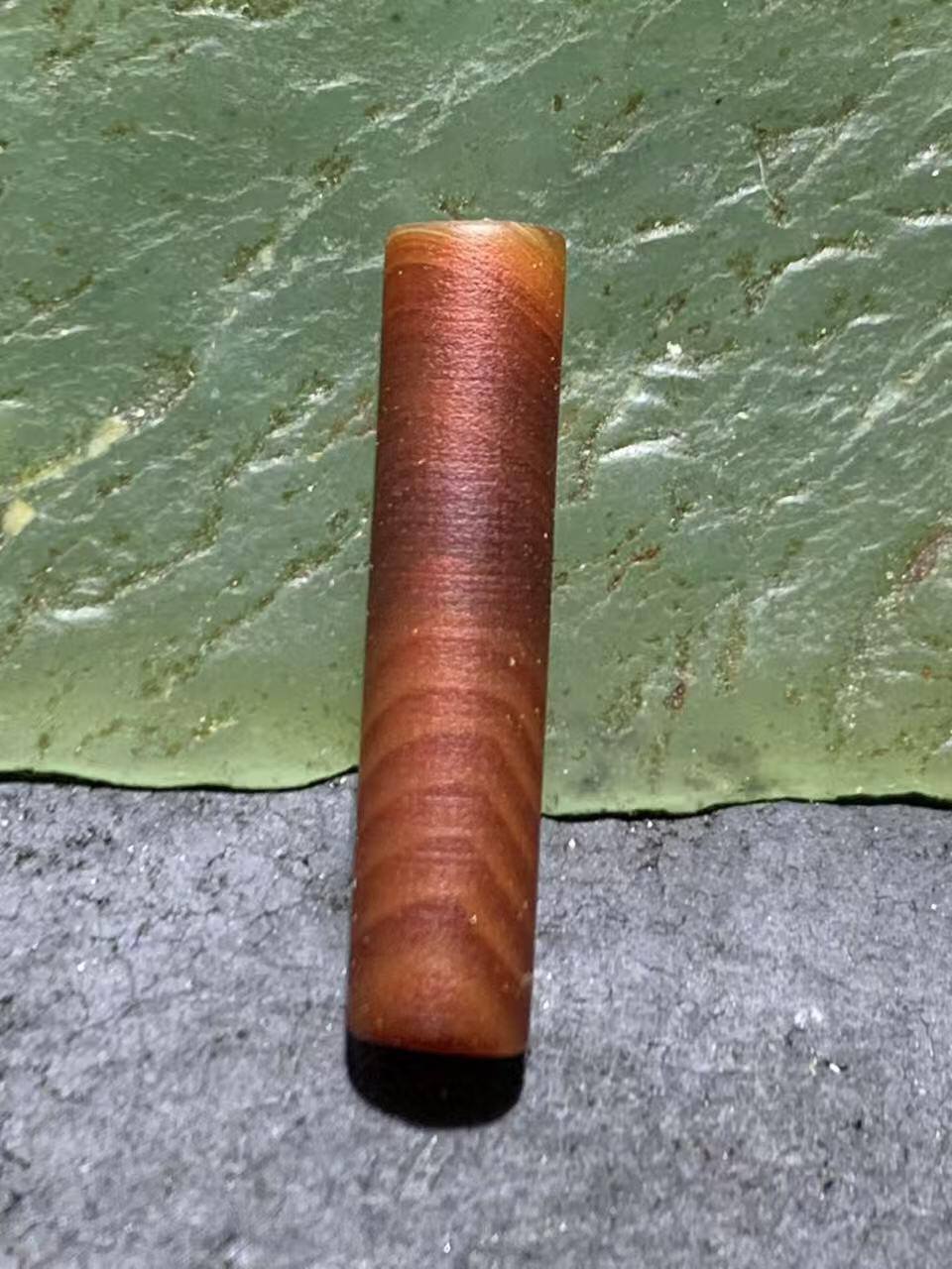 亚光风化纹高玉化酒红色千层纹缠丝玛瑙管珠一颗
