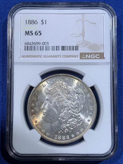 《竞宝斋》第417场 周日，周一，2场连拍 （全场包邮） - NGC MS65 美国 1886年 摩根银币 背面覆盖蓝彩色包浆