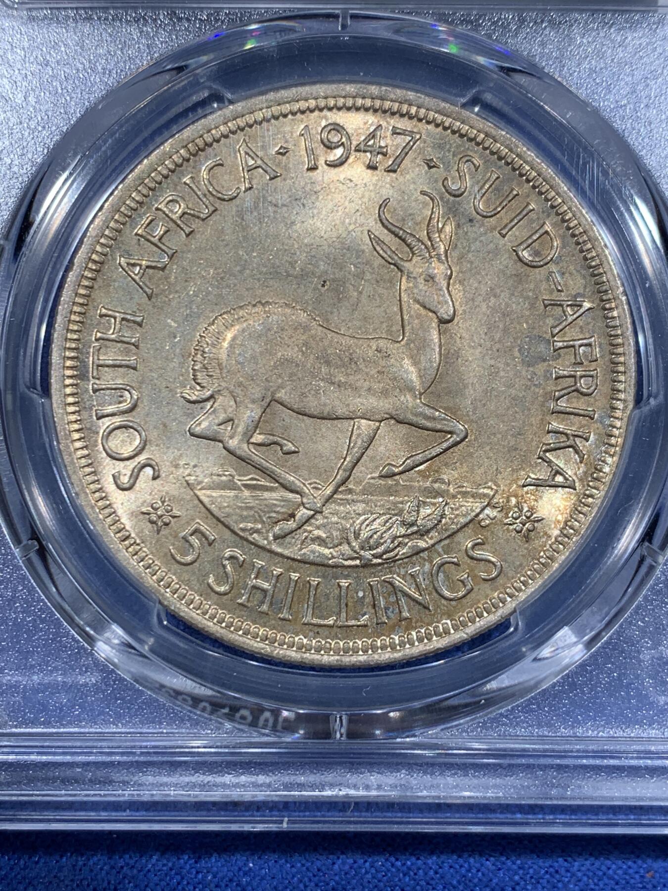 《竞宝斋》第417场 周日，周一，2场连拍 （全场包邮） PCGS MS63 南非1947年5先令，南非大主币首年份，双面淡金色包浆。