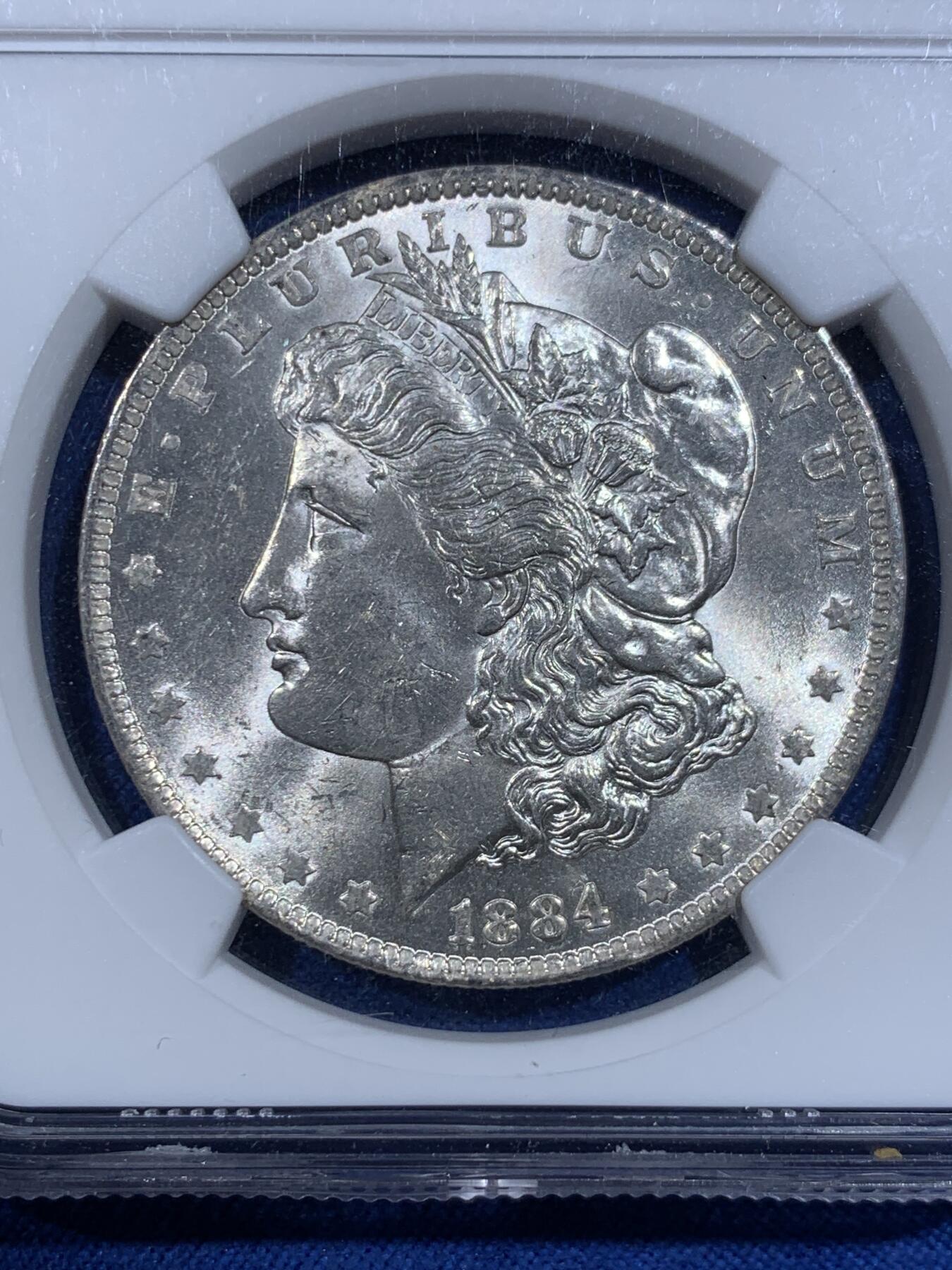 《竞宝斋》第417场 周日，周一，2场连拍 （全场包邮） NGC MS63 美国1884年摩根1美元银币 车轮转光 底板好 低评