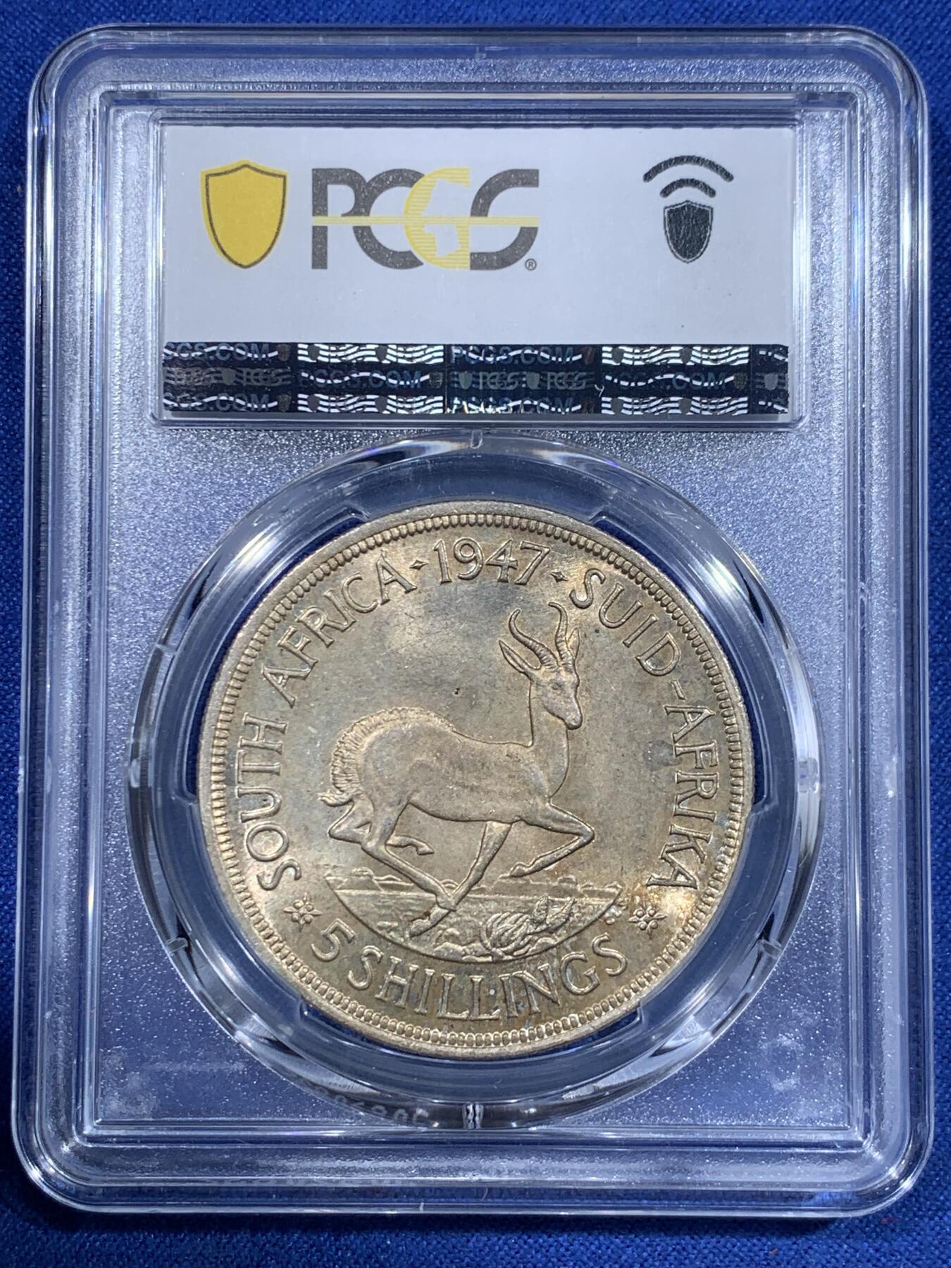 《竞宝斋》第417场 周日，周一，2场连拍 （全场包邮） PCGS MS63 南非1947年5先令，南非大主币首年份，双面淡金色包浆。