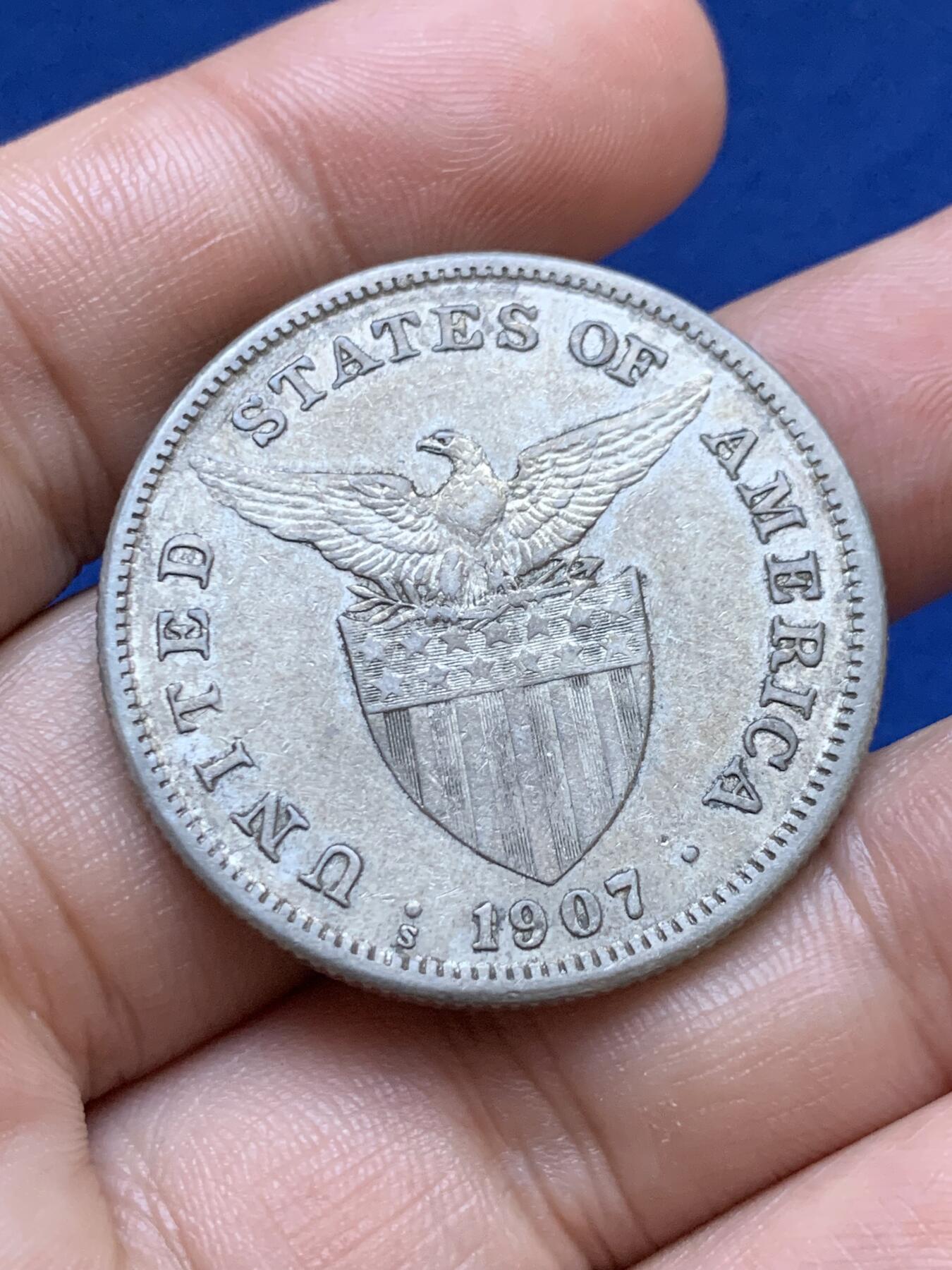 《竞宝斋》第417场 周日，周一，2场连拍 （全场包邮） 美属菲律宾1907年打铁1比索银币，带点包浆。