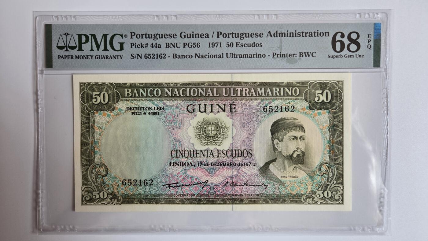 pmg评级币 葡属几内亚50埃斯库多  pmg68 亚军分 冠军分只有一张 无347靓号 探险家、奴隶商人努诺·特里1971