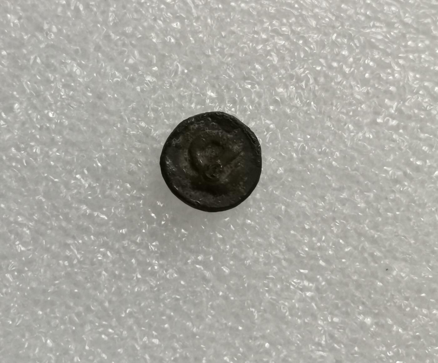 瓶子🏺第207期拍卖会  8世纪三佛齐王国檀香花图案打制银币