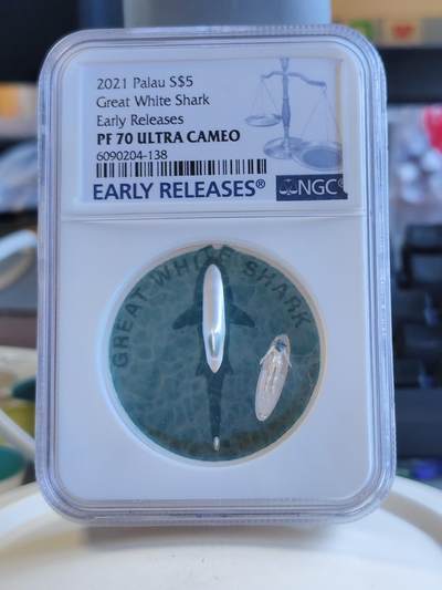 第174期拍卖【长期征集拍品】 - 首期NGC-PF70ULTRA CAMEO 帕劳2022年发行的大白鲨双面高浮雕彩色纪念银币（超高浮雕，1盎司克重，999纯银，币径38.61，限量发行2021枚，2022年硬币之星独特概念币第二名），无盒证书