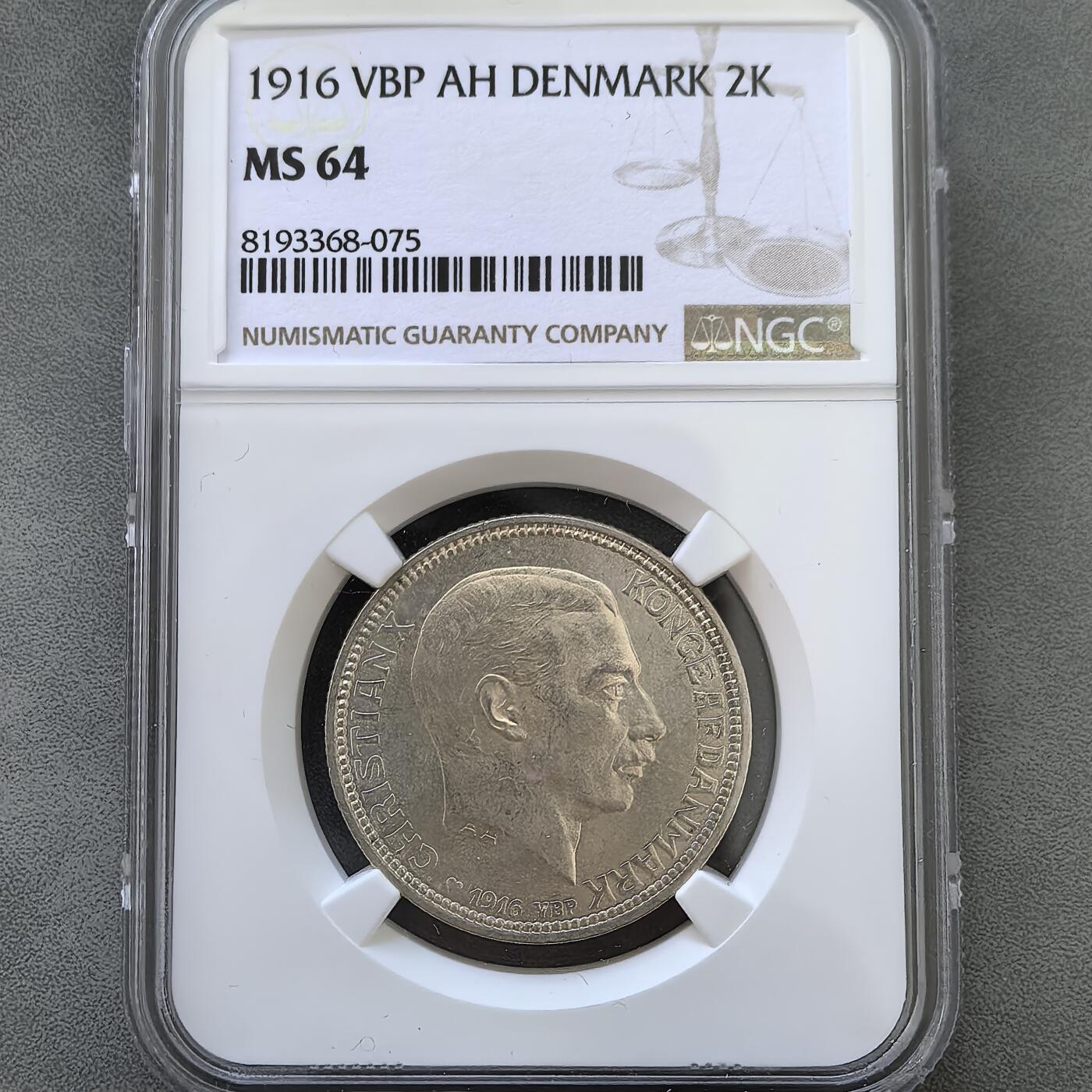道一币馆币章第一百四十五场 NGC MS64丹麦1916年海豚2克朗银币