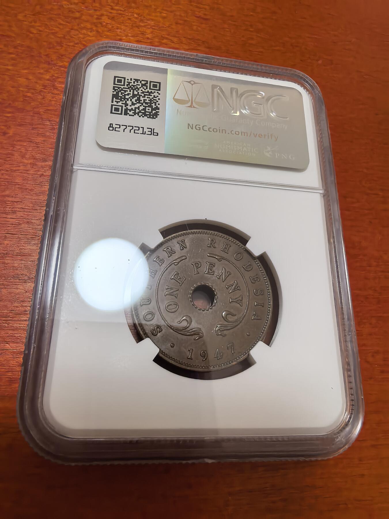 长老汇蛇年精选第四十四场拍卖 1947南罗德西亚1便士中孔铜币，NGC AU58BN，更高分仅有7枚