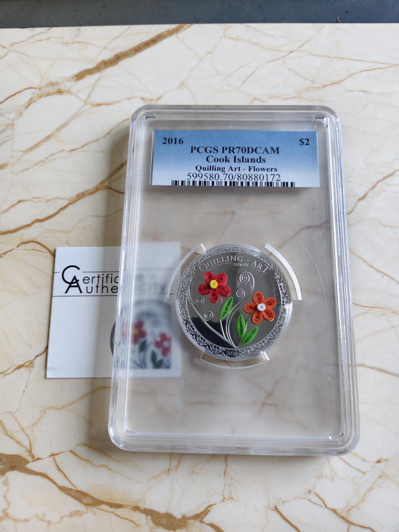 第175期拍卖【长期征集拍品】 库克2016年手工纸花艺术镶嵌纪念银币PCGS-PR70带证书，999银，15.5克，发行999枚
