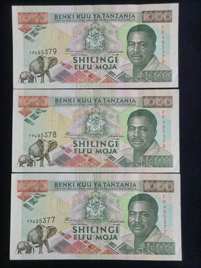 【游宝拍卖】乙巳蛇年67期 最低佣金1元起拍 - 坦桑尼亚-1000先令【三连号 FP495377/78/79 近新品相AU/AU- 软折】