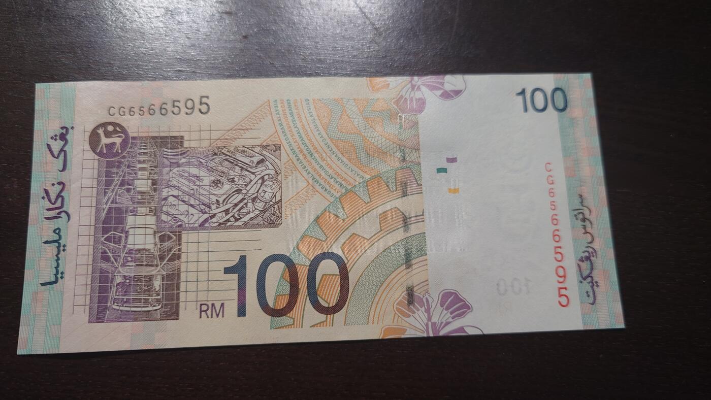 世界钱币～微拍第202期暨2025年第41期  老库存选购 2001年马来西亚100林吉特 全新绝品无47尾号595