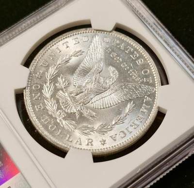 甄臻铺-世界币章拍卖（第33期），送拍享返佣金等优惠多多 NGC-MS63 1888年O版摩根，正面PL质感地板