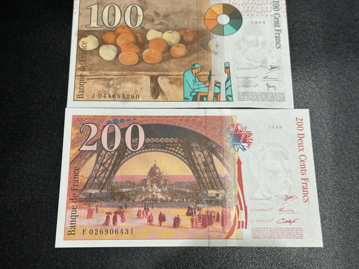 《外钞收藏家》第五百六十六期（本期精选热门裸币、优质评级币）（本平台长期征集拍品、欢迎藏友们联系合作） 法国末版100/200法郎2张（画家保罗塞尚+埃菲尔与铁塔）100有个小瑕疵	UNC	