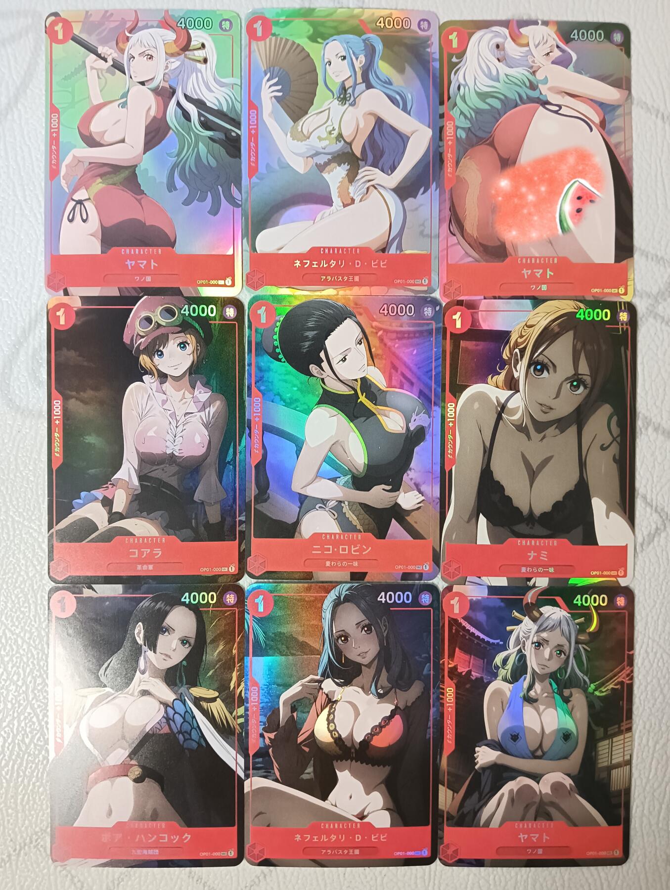 花开卡拍第38期（9月14号周日截拍，品控勿拍!!!拍品不寄存，运费5元，自制卡难免瑕疵，可能存在轻微撞角爆边等出厂瑕疵，品控介意勿拍！） 嘎嘎鸭海贼王系列彩闪卡 全女角色，9张